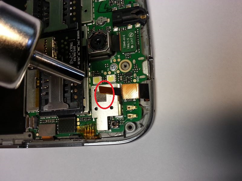 Chauffer la partie coll&eacute;e de la nappe du tacile